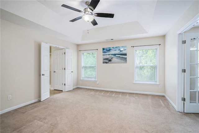 157 Spur Ln, Hiram, GA 30141 - unfurnished bedroom with carpet floors, a raised ceiling, and baseboards