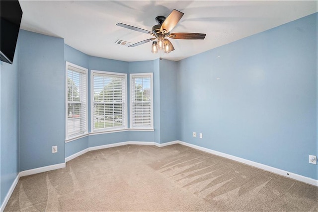 157 Spur Ln, Hiram, GA 30141 - carpeted spare room featuring baseboards and ceiling fan