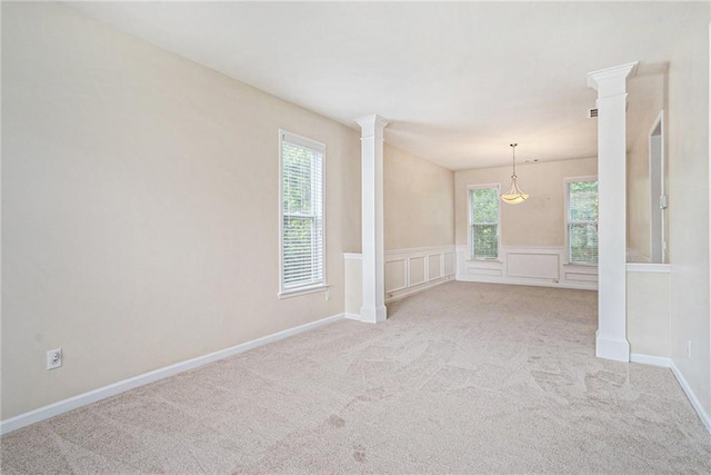 157 Spur Ln, Hiram, GA 30141 - carpeted spare room featuring decorative columns