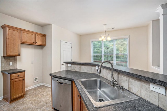 157 Spur Ln, Hiram, GA 30141 - kitchen with stainless steel dishwasher, a sink, brown cabinetry, dark countertops, and decorative backsplash