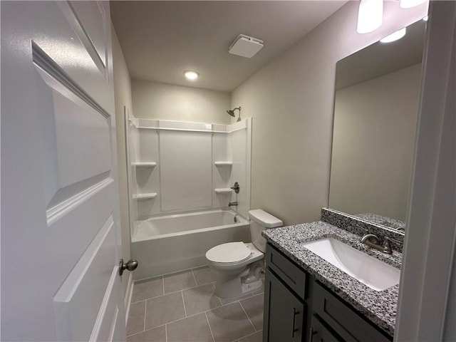 full bathroom featuring toilet, tile patterned floors, bathing tub / shower combination, and vanity