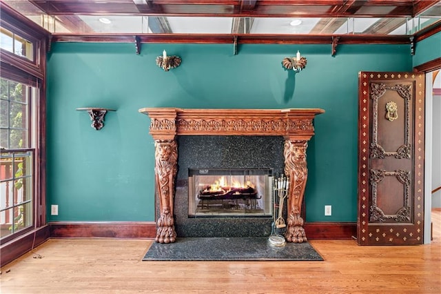 11569 Finley St, Suwanee, GA 30024 - detailed view of wood finished floors, a high end fireplace, and baseboards