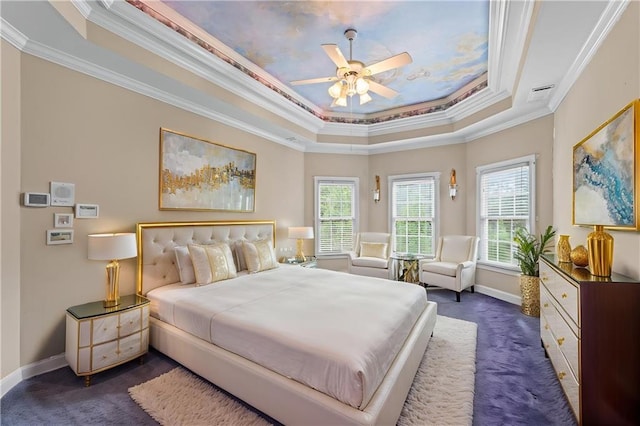11569 Finley St, Suwanee, GA 30024 - bedroom featuring a tray ceiling, dark colored carpet, crown molding, and baseboards