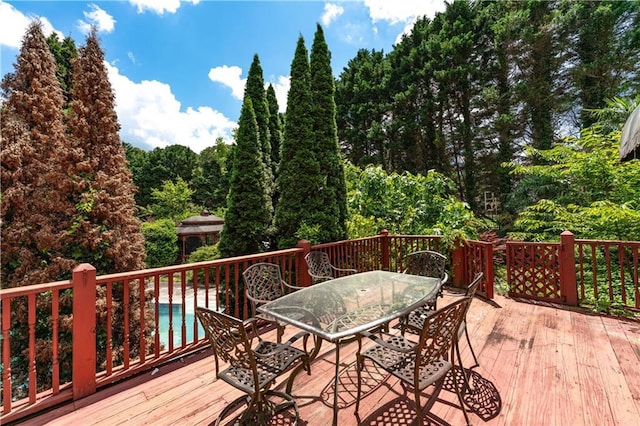 11569 Finley St, Suwanee, GA 30024 - deck with outdoor dining area