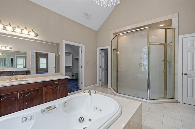 11569 Finley St, Suwanee, GA 30024 - bathroom featuring vaulted ceiling, a shower stall, a whirlpool tub, and vanity