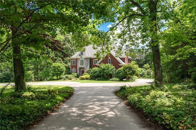 11569 Finley St, Suwanee, GA 30024 - view of front of house featuring curved driveway