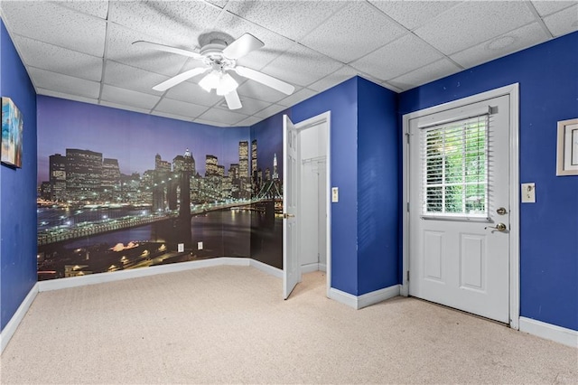 11569 Finley St, Suwanee, GA 30024 - unfurnished room with baseboards, carpet floors, a drop ceiling, and a ceiling fan