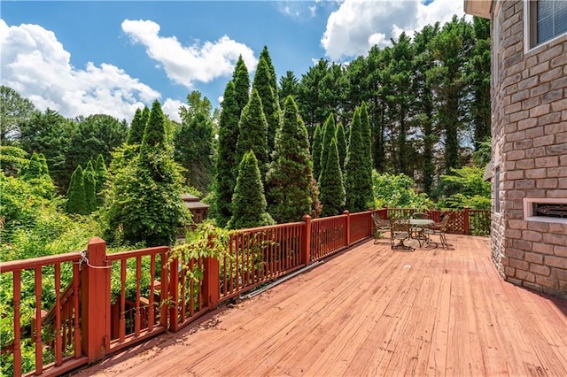 11569 Finley St, Suwanee, GA 30024 - wooden terrace with outdoor dining space