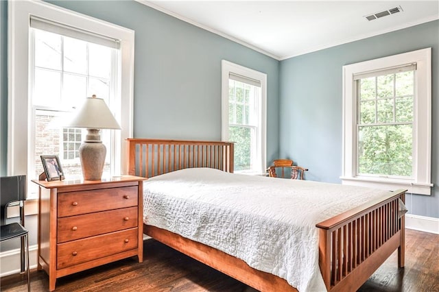 50 Rumson Way NE, Atlanta, GA 30305 - bedroom featuring dark wood-type flooring, ornamental molding, baseboards, and visible vents