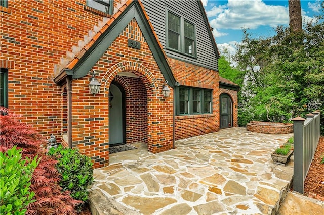 50 Rumson Way NE, Atlanta, GA 30305 - exterior space featuring a patio and brick siding