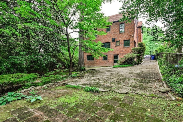 50 Rumson Way NE, Atlanta, GA 30305 - back of property featuring brick siding and fence