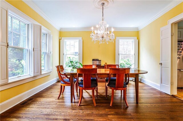50 Rumson Way NE, Atlanta, GA 30305 - dining area with baseboards, ornamental molding, dark wood-style flooring, and a notable chandelier
