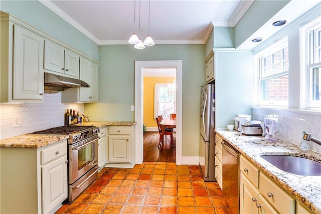 50 Rumson Way NE, Atlanta, GA 30305 - kitchen with decorative light fixtures, appliances with stainless steel finishes, tasteful backsplash, a sink, and under cabinet range hood