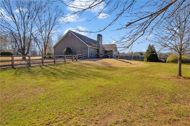 view of yard featuring fence