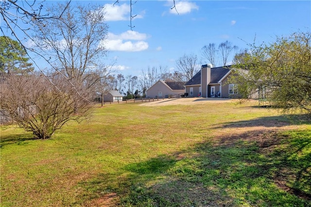 view of yard featuring fence