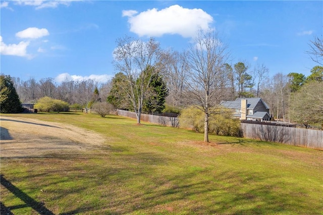 view of yard with fence