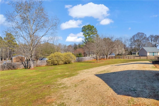 view of yard with fence