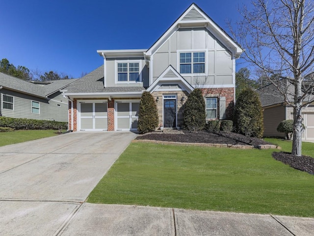 view of front of property with a garage and a front lawn