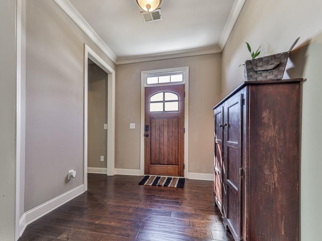 entryway featuring crown molding and dark hardwood / wood-style flooring