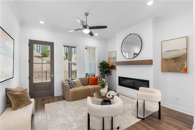 4918 Sudbrook Way Unit 252, Peachtree Corners, GA 30092 - living room with a glass covered fireplace, wood finished floors, crown molding, and ceiling fan