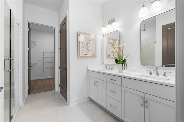 4918 Sudbrook Way Unit 252, Peachtree Corners, GA 30092 - full bathroom with a sink, double vanity, a stall shower, baseboards, and marble finish floor