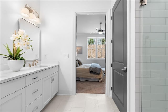 4918 Sudbrook Way Unit 252, Peachtree Corners, GA 30092 - bathroom featuring tile patterned floors, a sink, double vanity, ensuite bathroom, and ceiling fan