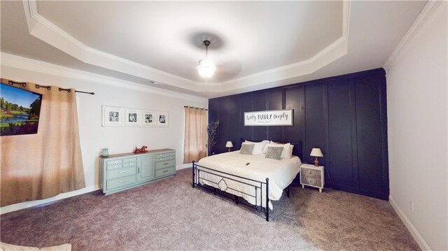 bedroom featuring carpet, crown molding, a raised ceiling, visible vents, and baseboards