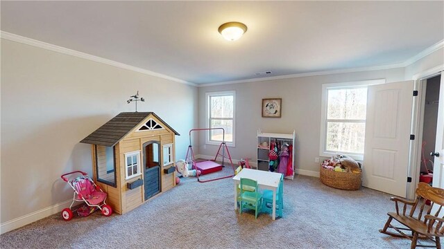 game room featuring crown molding, carpet, visible vents, and baseboards