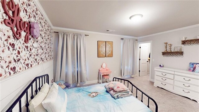 bedroom featuring baseboards, carpet floors, visible vents, and crown molding