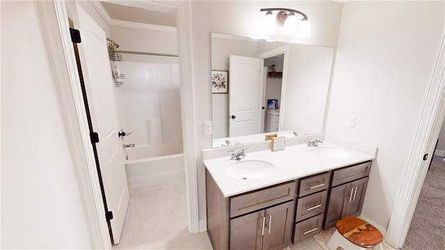 bathroom featuring washtub / shower combination and vanity