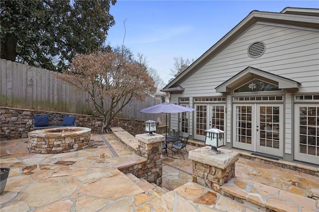 101 Terrace Dr, Atlanta, GA 30305 - view of patio / terrace with an outdoor fire pit, french doors, and a fenced backyard