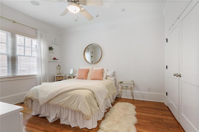 101 Terrace Dr, Atlanta, GA 30305 - bedroom featuring crown molding, wood finished floors, baseboards, and a ceiling fan