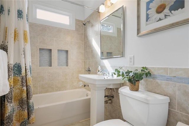101 Terrace Dr, Atlanta, GA 30305 - full bath with toilet, tile walls, plenty of natural light, and shower / bath combo with shower curtain