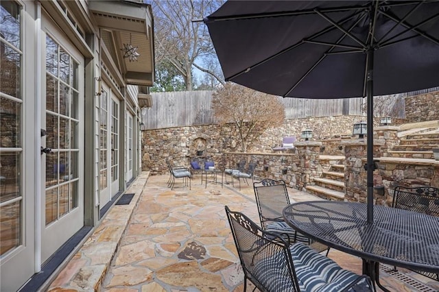 101 Terrace Dr, Atlanta, GA 30305 - view of patio / terrace featuring outdoor dining area, french doors, and fence