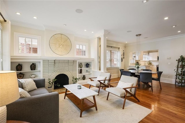 101 Terrace Dr, Atlanta, GA 30305 - living area with crown molding, recessed lighting, light wood-style floors, baseboards, and a fireplace