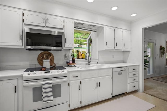 2621 Pass Cir, Gainesville, GA 30506 - kitchen featuring white appliances, a sink, white cabinets, light countertops, and recessed lighting