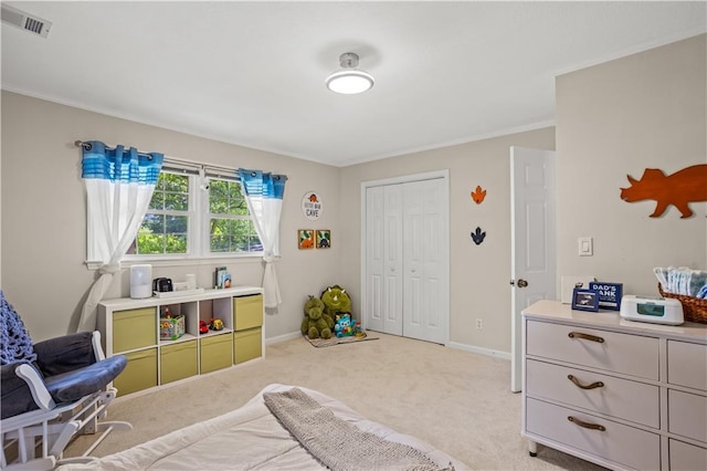 2621 Pass Cir, Gainesville, GA 30506 - bedroom with light colored carpet, a closet, baseboards, and ornamental molding