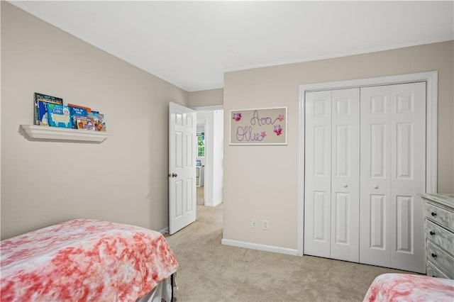 2621 Pass Cir, Gainesville, GA 30506 - bedroom featuring light carpet, baseboards, a closet, and crown molding