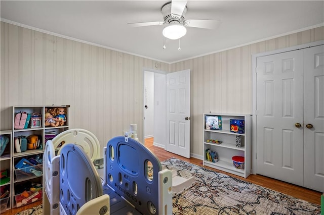 2621 Pass Cir, Gainesville, GA 30506 - game room featuring wood finished floors, a ceiling fan, and ornamental molding