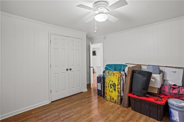 2621 Pass Cir, Gainesville, GA 30506 - recreation room featuring wood finished floors, ornamental molding, and a ceiling fan
