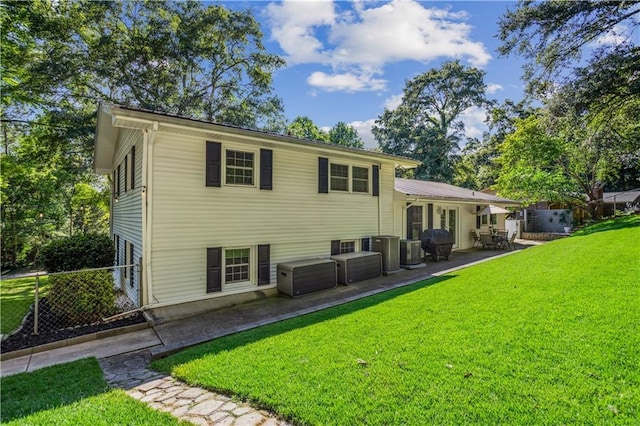 2621 Pass Cir, Gainesville, GA 30506 - back of property featuring a patio area and central AC