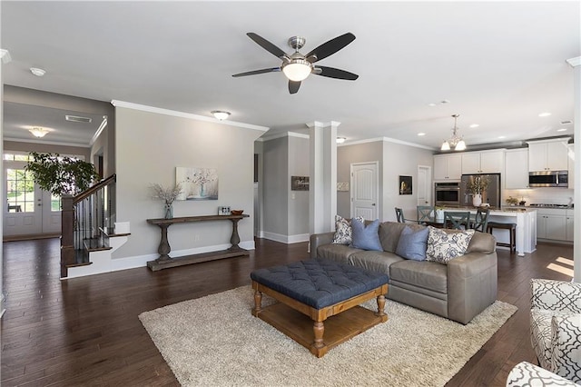 5240 Bristlecone Pine Way, Cumming, GA 30040 - living area featuring recessed lighting, a ceiling fan, dark wood finished floors, ornamental molding, and stairway