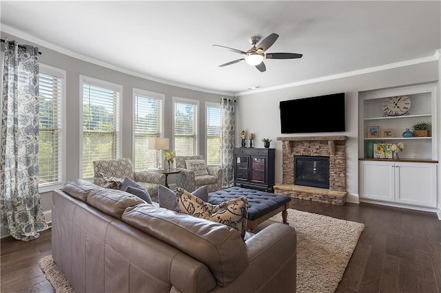 5240 Bristlecone Pine Way, Cumming, GA 30040 - living area with ornamental molding, a ceiling fan, dark wood-style flooring, and a fireplace