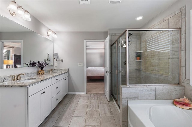 5240 Bristlecone Pine Way, Cumming, GA 30040 - ensuite bathroom featuring a bath, double vanity, a shower stall, and recessed lighting