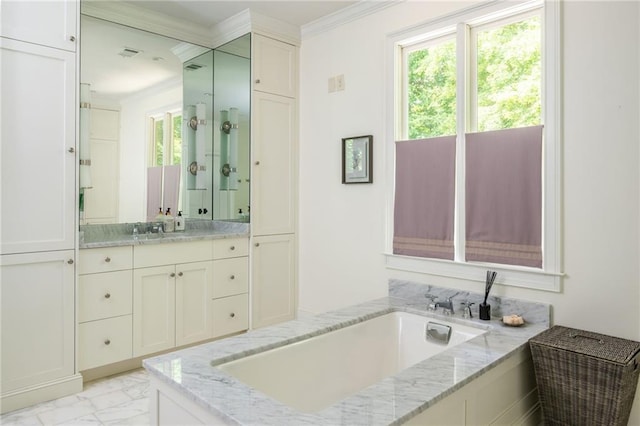 full bath with ornamental molding, a bath, marble look tiles, and vanity
