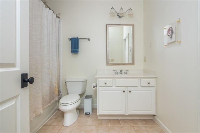 full bath featuring baseboards, tile patterned flooring, toilet, and vanity