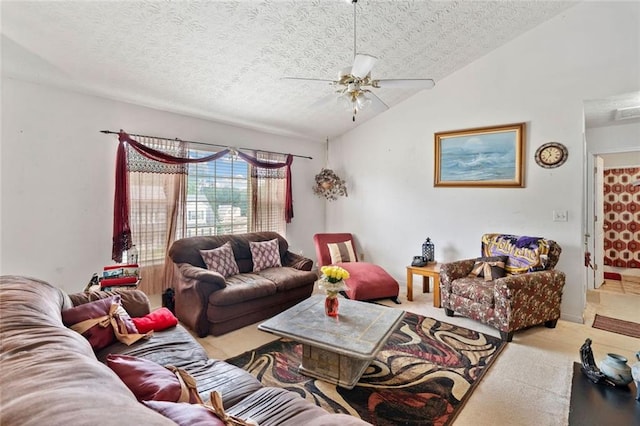 living area featuring a textured ceiling, vaulted ceiling, light colored carpet, and a ceiling fan