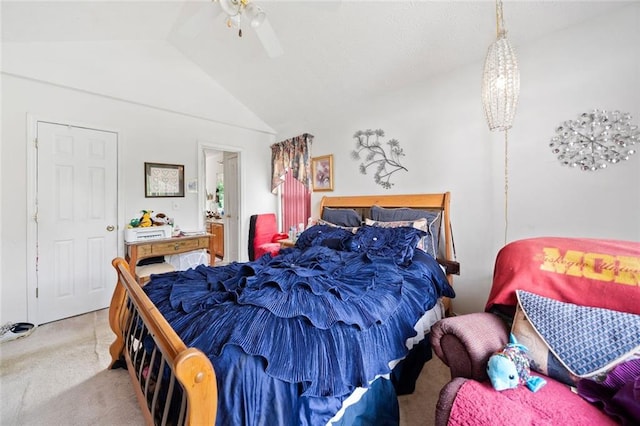 bedroom with carpet floors, lofted ceiling, and a ceiling fan