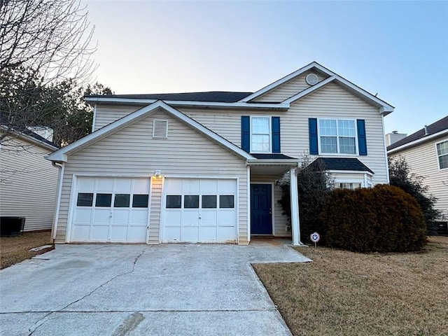 front facade with a garage