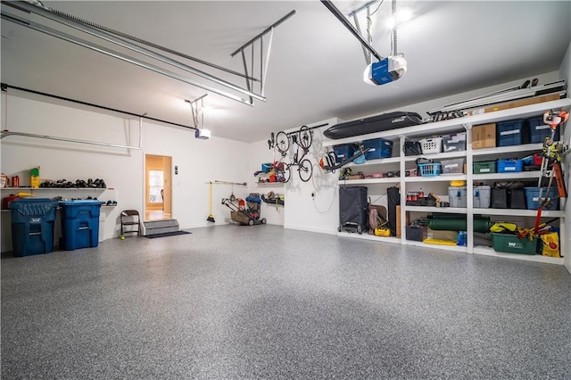 garage featuring a garage door opener